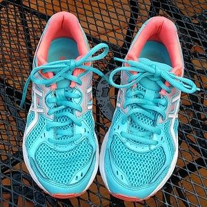 Pair of Asics tennis shoes